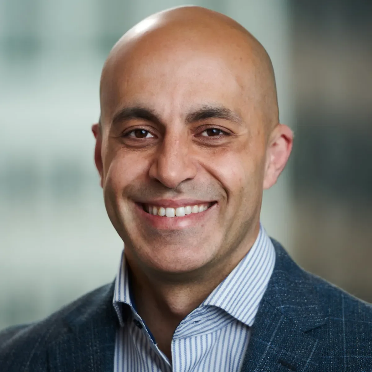 Portrait of Ali Ghodsi, CEO of Databricks.