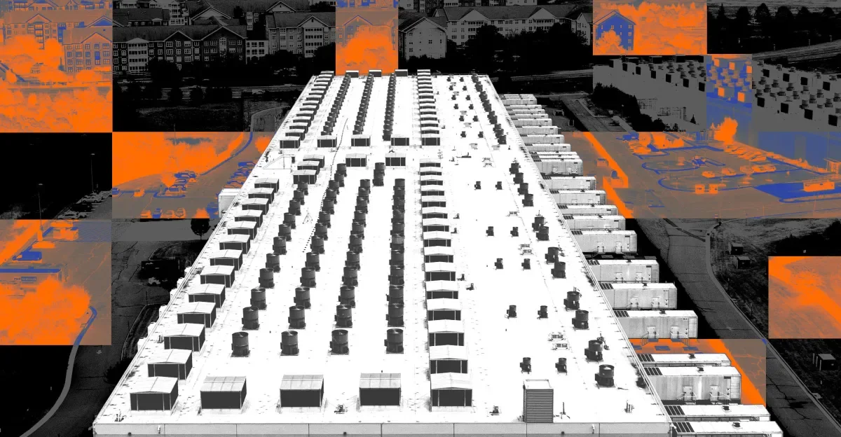 Aerial view of a large industrial data center building with rooftop cooling units.